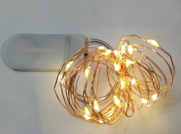 20 Warm White Copper Wire LED Battery Timer Lights for indoor use.